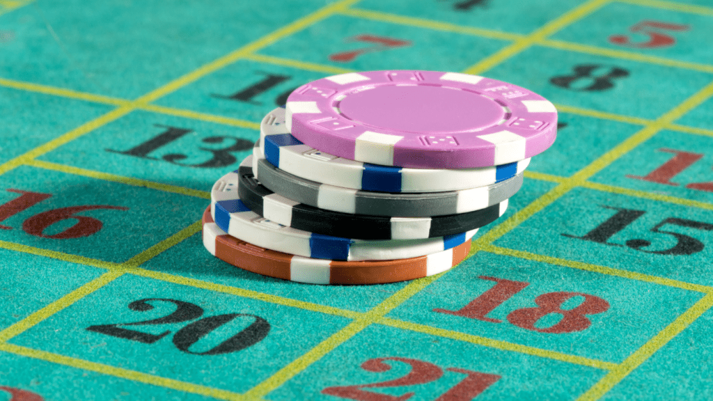 Casino chips on Roulette table